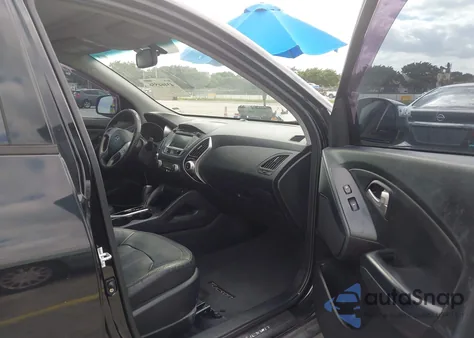 2013 Hyundai Tucson Limited z USA, uszkodzony, nr VIN KM8JU3AC5DU729902